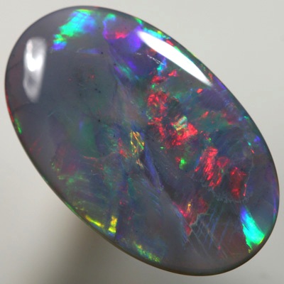 SOLID SEMI BLACK OPAL Bright cherry red to golden fire. SEE VIDEO